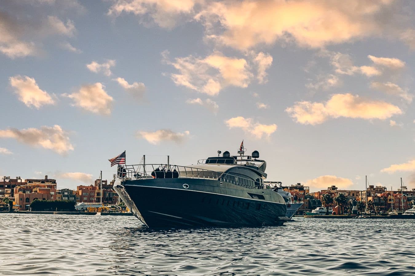 Private yacht deck at sunset